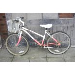 A WHITE AND PINK MTB MOUNTAIN BELLE SUPER RIDER CHILDRENS BICYCLE, 14 inch frame, shimano gears