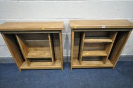 A PAIR OF SOLID OAK OPEN BOOKCASES/CD RACKS with two shelves (one missing shelf peg and one unit