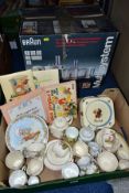 A BOX OF ASSORTED CHILDRENS CERAMIC TEAWARES, MABEL LUCIE ATTWELL COLLECTABLES AND A BOXED BRAUN