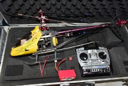 TWO RADIO CONTROLLED HELICOPTERS, not tested, one appears largely complete, the other is