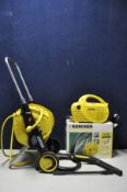 A KARCHER K090 lightweight portable jet wash boxed with lance and hose (PAT pass and working)