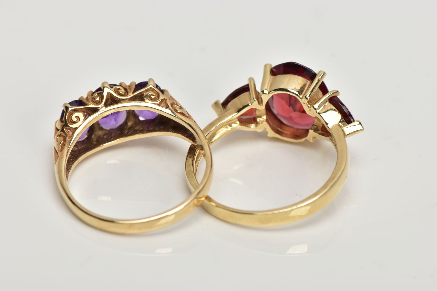TWO 9CT GOLD GEM SET RINGS, the first designed with a central four claw set, oval cut garnet, - Image 3 of 3