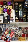 A BOX OF ASSORTED ITEMS, to include a horn spoon and a selection of beaded necklaces, clip on