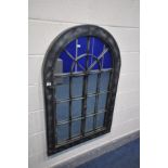 A METAL ARCHED PANEL EFFECT WALL MIRROR, with double opening doors, 75cm x 115cm