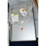 A 17-INCH APPLE MACBOOK PRO MODEL NO A1286, SERIAL NO. W98490Q17XK, WITH MAGSAFE POWER SUPPLY AND