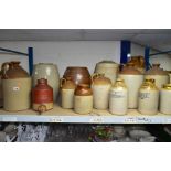 FOURTEEN STONEWARE BOTTLES, FLAGONS AND KEGS, to include bottles printed J H Jones and Sons,