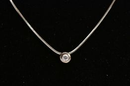 A DIAMOND PENDANT NECKLACE, the pendant of a circular design, set with a round brilliant cut