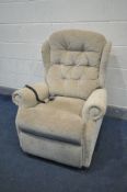 A CELEBRITY CREAM UPHOLSTERED RISE AND RECLINE ARMCHAIR (PAT pass and working)