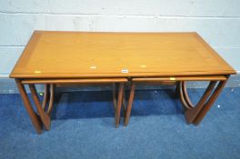 A LATE 20TH CENTURY G PLAN TEAK NESTING TABLES, coffee table width 110cm x depth 50cm x height 52cm