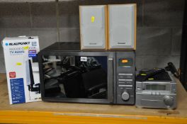 A RUSSELL HOBBS RHMDL801G microwave, Panasonic SA-PM03 mini stereo system (all PAT pass and working)