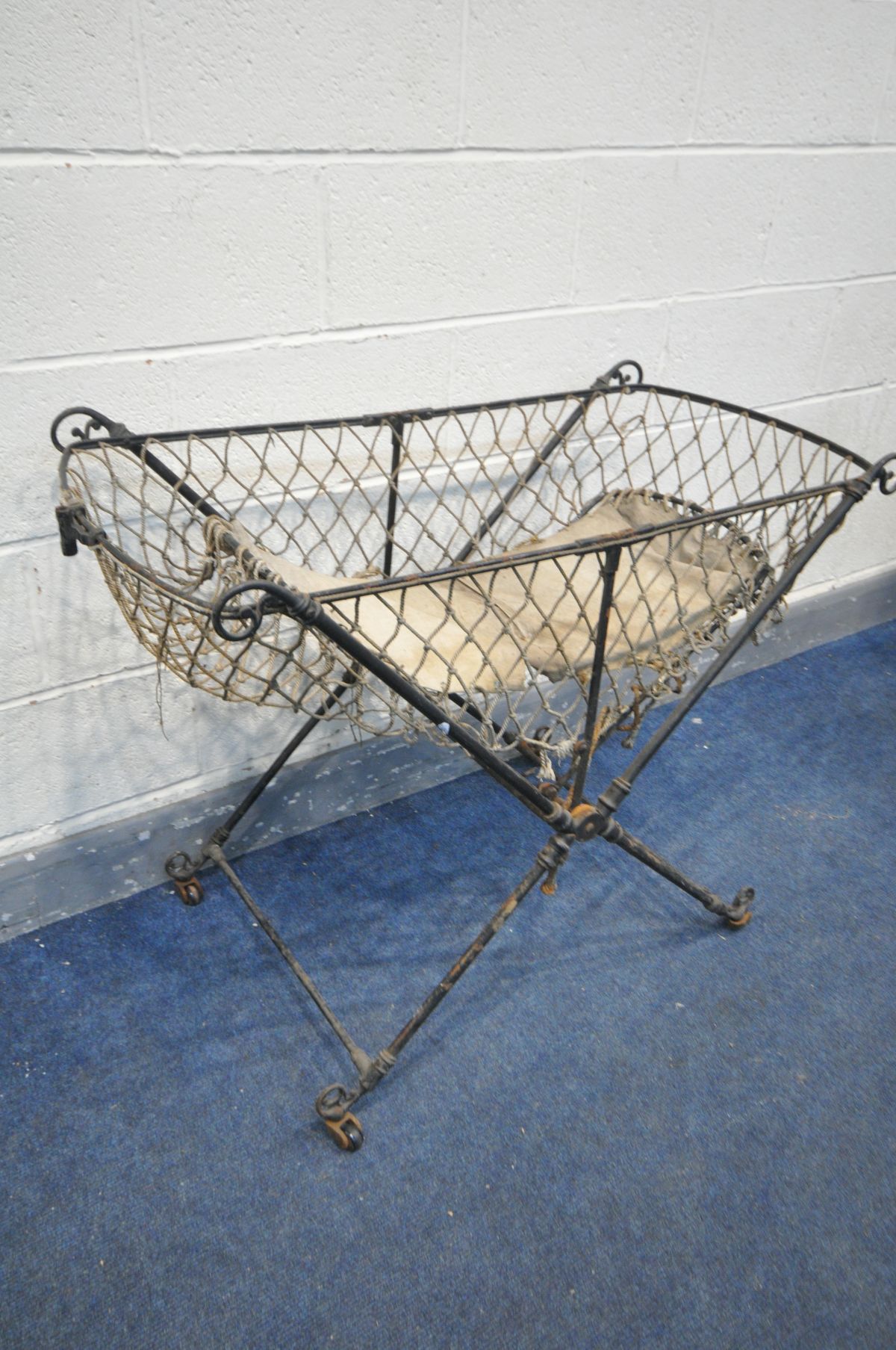 A VICTORIAN WROUGHT IRON FOLDING CHILDS COT - Image 2 of 3