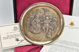 A SILVER BIRMINGHAM MINT 1974 CHRISTMAS PLATE, circular plate with embossed christmas design