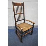 A 19TH CENTURY LANCASHIRE ROCKING CHAIR, with a rush seat (condition:-rush seat worn)