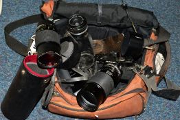 PHOTOGRAPHIC EQUIPMENT COMPRISING OF A BLACK OM2N 35MM SLR CAMERA BODY, a 50mm f2 Olympus lens,