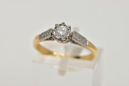 A YELLOW METAL SINGLE STONE DIAMOND RING, designed with a claw set round brilliant cut diamond,