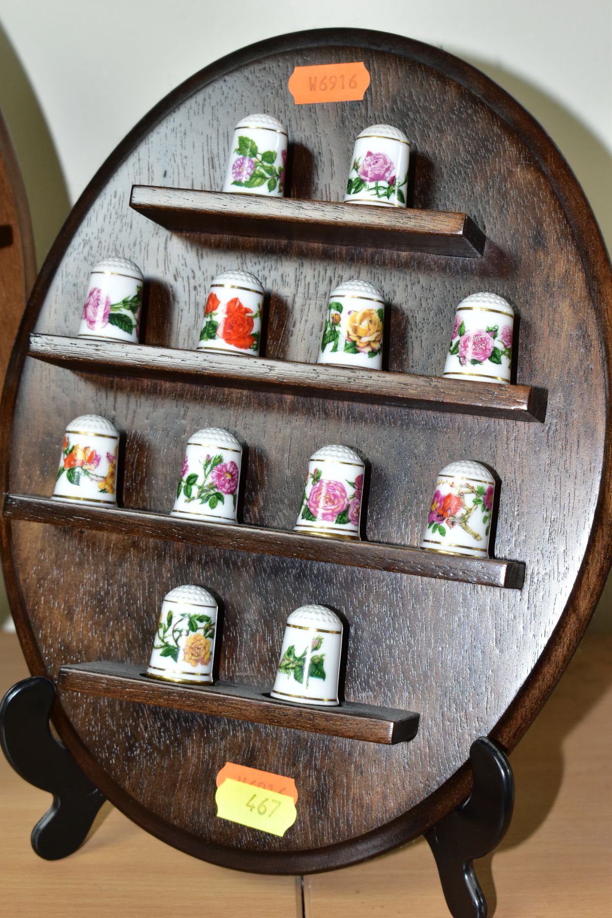 TWO WALL HANGING THIMBLE DISPLAY SHELVES CONTAINING MODERN PORCELAIN THIMBLES, comprising a set of - Image 2 of 15