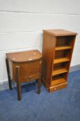 AN 1930'S OAK SEWING BOX containing sewing accessories, and a modern revolving cd rack (2)