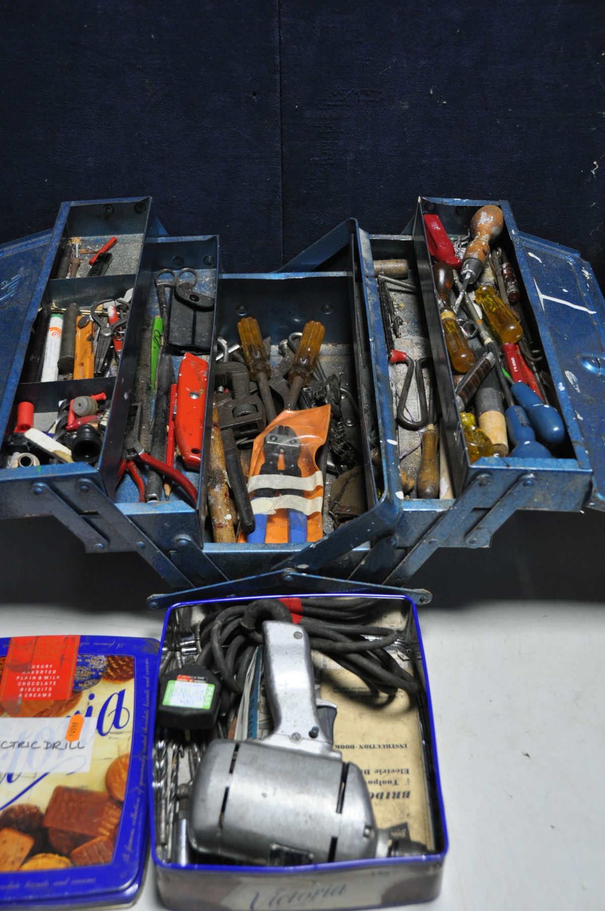 A METAL TOOLBOX containing various hand tools, screwdrivers, spanners, files etc along with a