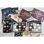 A CARDBOARD BOX CONTAINING ROYAL MINT ITEMS OF COINS, to include a 1970 GB & Northern Ireland coin