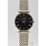 A GENTLEMENS 'LONGINES' WRISTWATCH, round black textured dial signed 'Longines', Roman numerals,