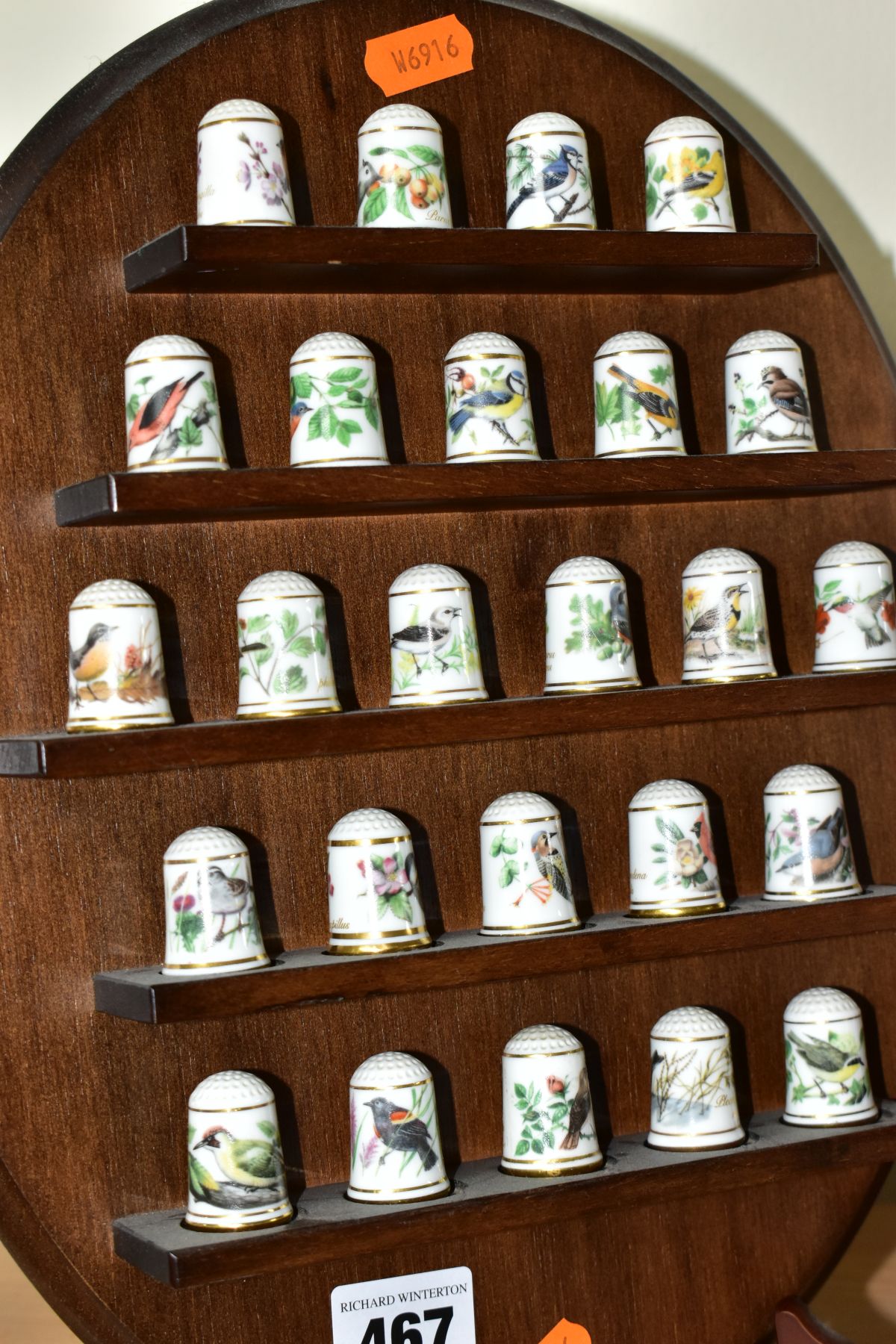 TWO WALL HANGING THIMBLE DISPLAY SHELVES CONTAINING MODERN PORCELAIN THIMBLES, comprising a set of - Image 3 of 15