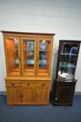 A MODERN OAK EFFECT TRIPLE DOOR DISPLAY CABINET, with three drawers, width 118cm x depth 40cm x