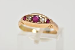 AN EARLY 20TH CENTURY, 18CT GOLD RUBY AND DIAMOND BOAT RING, designed with three circular cut