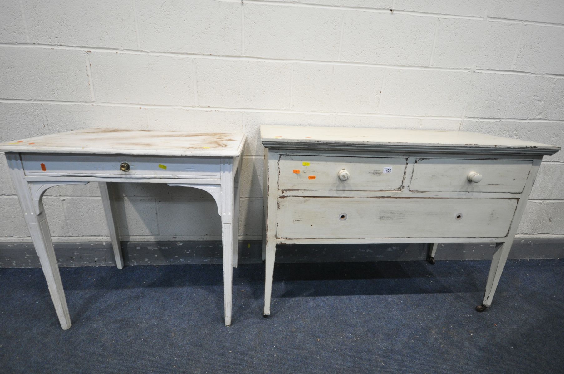 A PAINTED MAHOGANY CHEST OF THREE DRAWERS, on square tapering legs, width 107cm x depth 48cm x