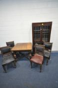 AN EARLY 20TH CENTURY OAK DRAW LEAF TABLE with a cross stretcher, 91cm squared x open width 151cm