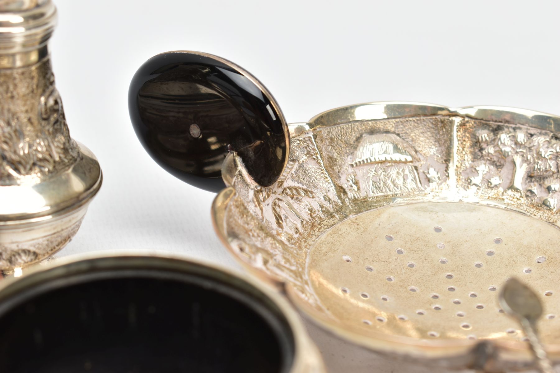 A SELECTION OF INDIAN WHITE METAL ITEMS, to include a white metal tea strainer with a circular - Image 8 of 10