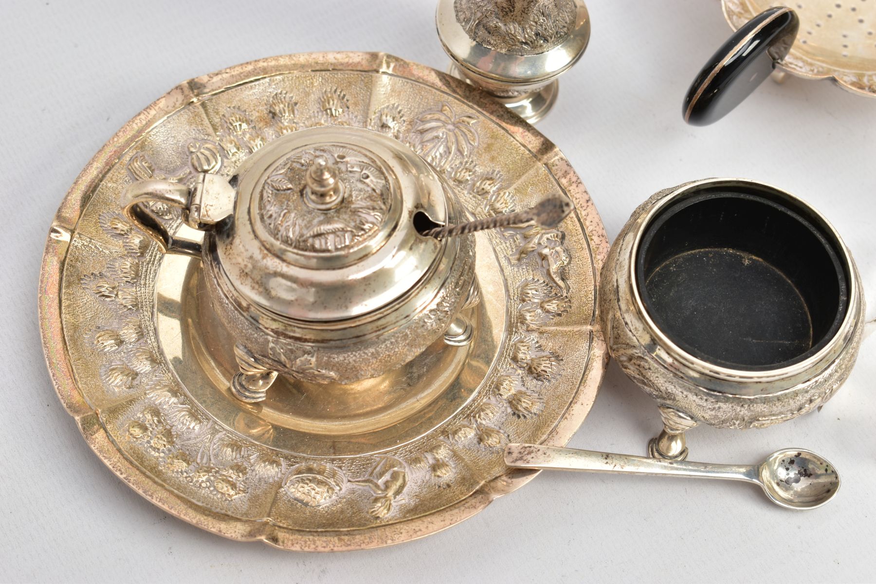 A SELECTION OF INDIAN WHITE METAL ITEMS, to include a white metal tea strainer with a circular - Image 10 of 10