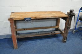 A BESPOKE PINE WORK BENCH, with block legs, plank top, vintage lap vice, modern guardsman's vice and