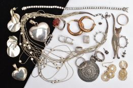 A SELECTION OF SILVER JEWELLERY, to include a solid silver heart pendant with a hinged bail, a