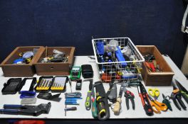 A COLLECTION OF TOOLS to include a tray of screwdriver bits, tray of drill bits a tray of hand tools