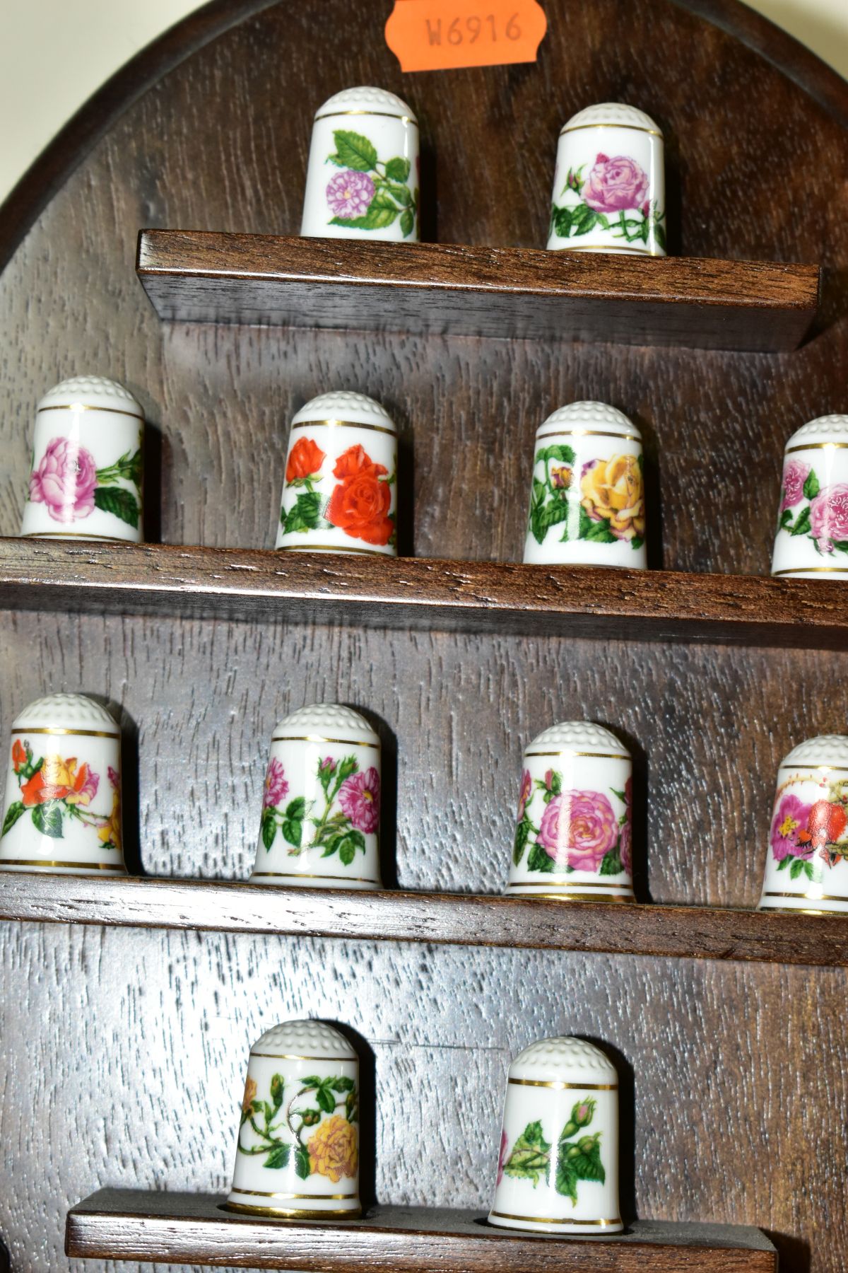 TWO WALL HANGING THIMBLE DISPLAY SHELVES CONTAINING MODERN PORCELAIN THIMBLES, comprising a set of - Image 4 of 15