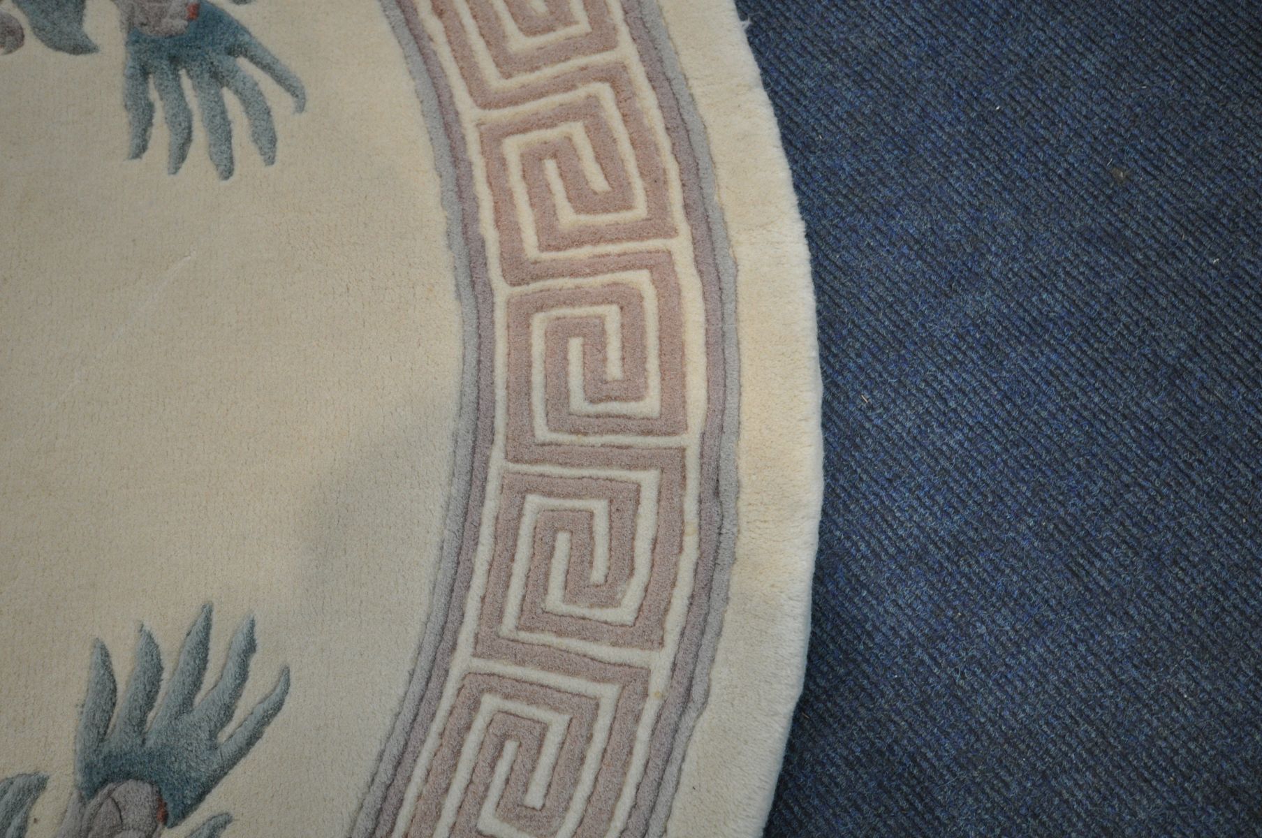 A CIRCULAR CREAM CHINESE RUG, with a dragon pattern, diameter 155cm - Image 4 of 4