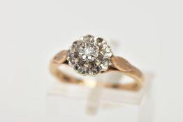 A 9CT GOLD DIAMOND CLUSTER RING, slightly raised cluster within an illusion set single cut diamond