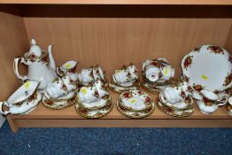 ROYAL ALBERT OLD COUNTRY ROSES TEA WARES, comprising fourteen tea cups, 16 saucers and side