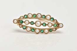 A 9CT GOLD EMERALD AND SPLIT PEARL BROOCH, of marquise shape outline, designed as a central and