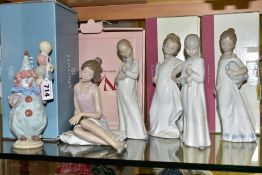 A BOXED LLADRO 5811 'LITTLEST CLOWN' FIGURE AND FIVE NAO FIGURES, three with boxes, Lladro figure