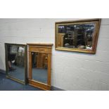 A LARGE GILT FRAMED BEVELLED EDGE WALL MIRROR, 132cm x 106cm, a pine overmantle mirror, 87cm x 137cm