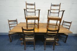 AN OAK REFECTORY TABLE on a trestle base, length 212cm x depth 101cm x height 76cm and eight