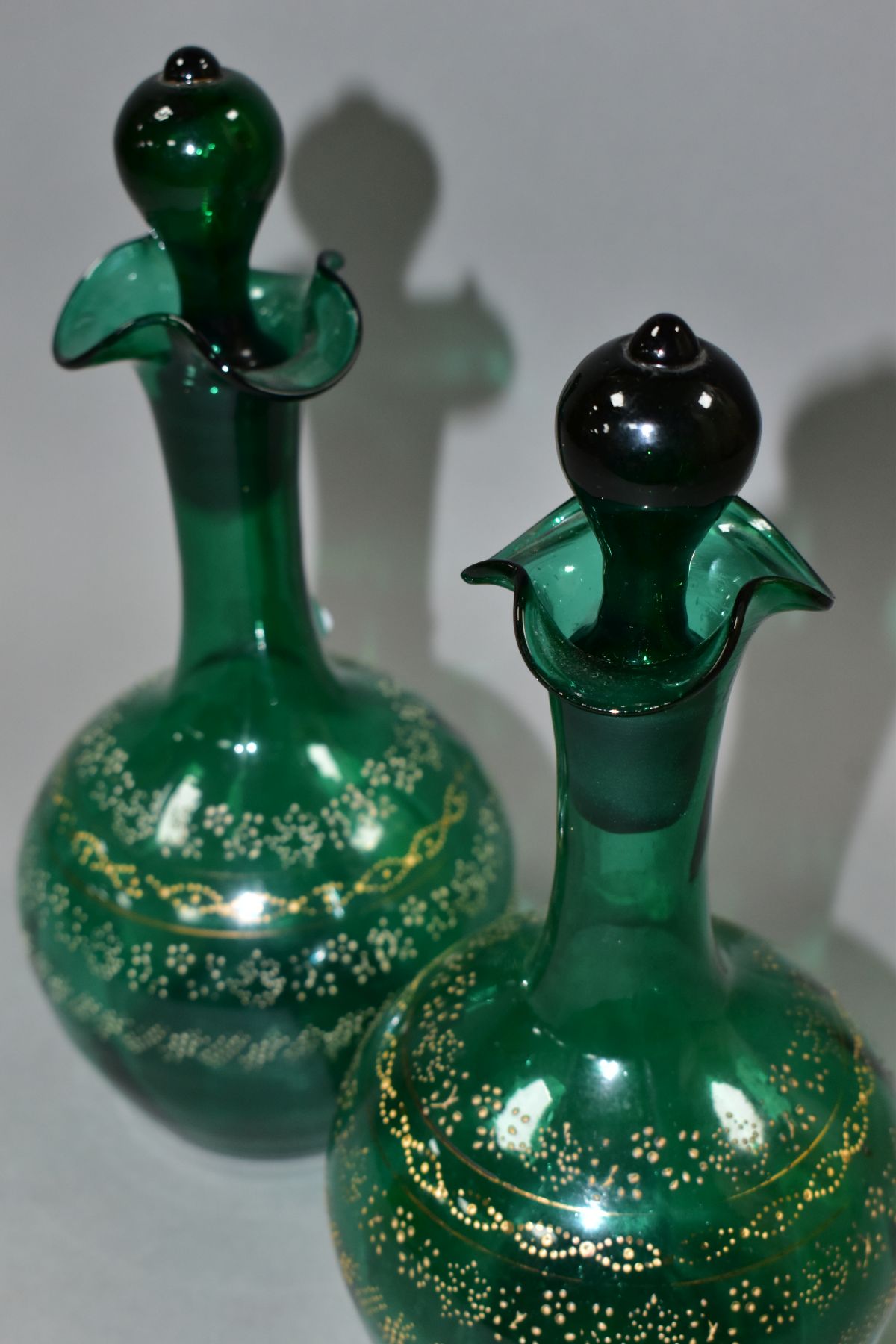 A PAIR OF VICTORIAN GREEN GLASS DECANTERS, with stoppers and four bands of dotted floral and other - Image 4 of 10