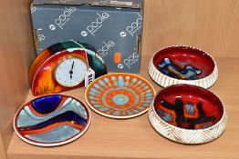 FIVE PIECES OF POOLE POTTERY COMPRISING A BOXED GEMSTONES HALF MOON CLOCK, two circular shallow