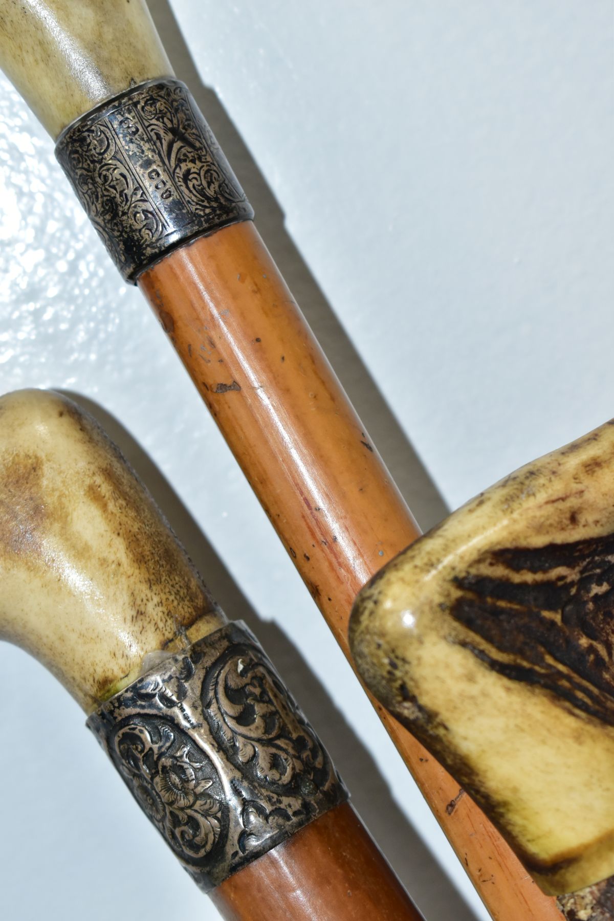 FOUR WALKING STICKS, various materials, one malacca stick, three have antler handles, one with a - Image 7 of 10