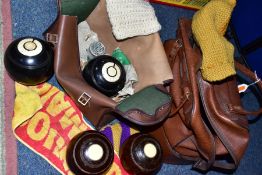 TWO BOWLING BAGS CONTAINING CROWN GREEN BOWLS, comprising two 20th Century bowling bags,