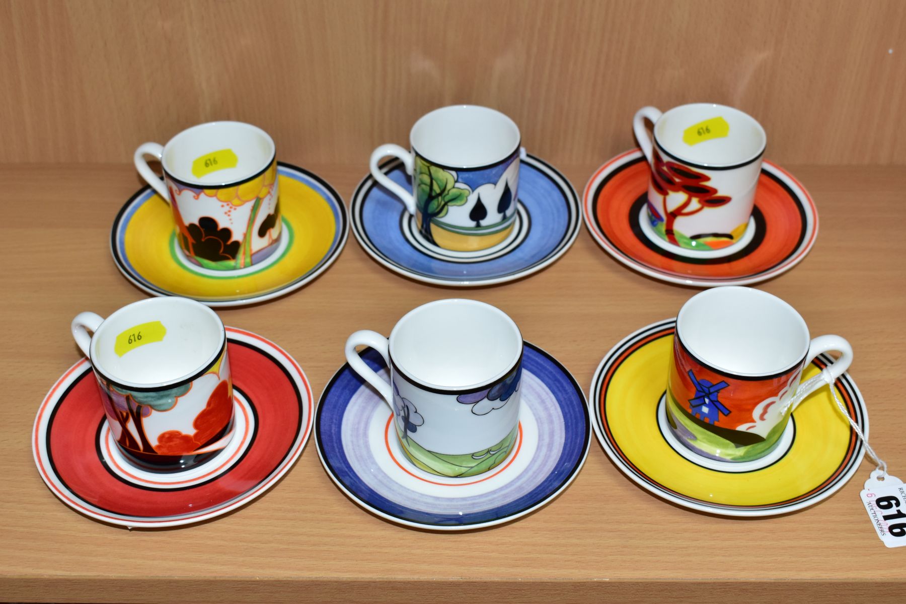 SIX WEDGWOOD / BRADFORD EXCHANGE LIMITED EDITION CLARICE CLIFF COFFEE CANS AND SAUCERS, comprising