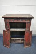 A DISTRESSED PERIOD ORIENTAL TWO DOOR CABINET, red lacquered with three drawers, width 101cm x depth