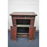 A DISTRESSED PERIOD ORIENTAL TWO DOOR CABINET, red lacquered with three drawers, width 101cm x depth