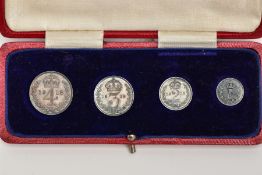 A CASED 'MAUNDY MONEY 1918' SET, four piece George V set, with original fitted case (condition